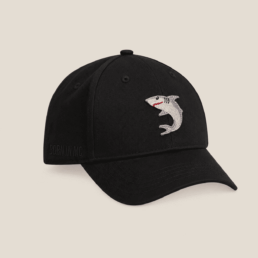 black cap with shark emoji