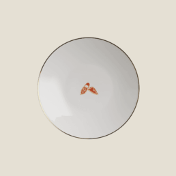 Beefbar x Bernardaud porcelain plate with gold rim and Moroccan babouche slippers emoji
